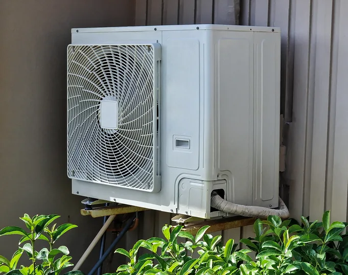 Ductless mini-split head mounted on an interior wall in a Florida home