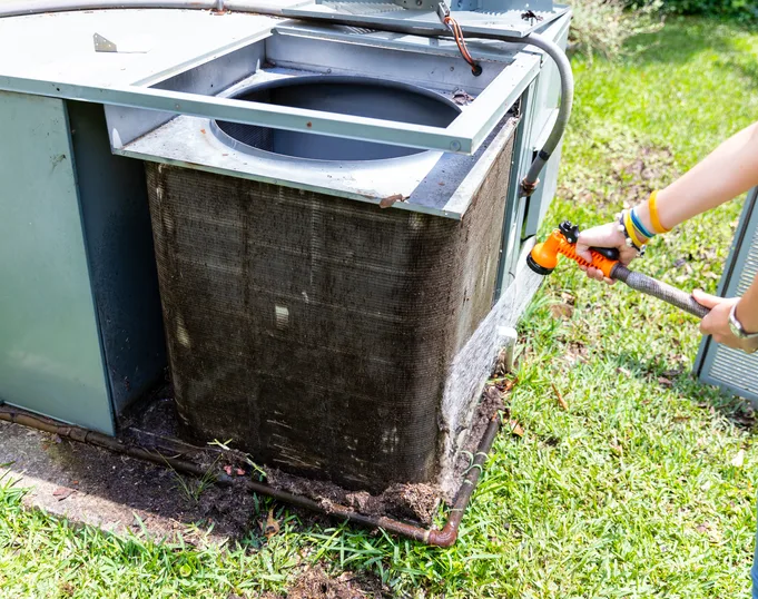 Residential packaged HVAC unit installed beside a Florida home